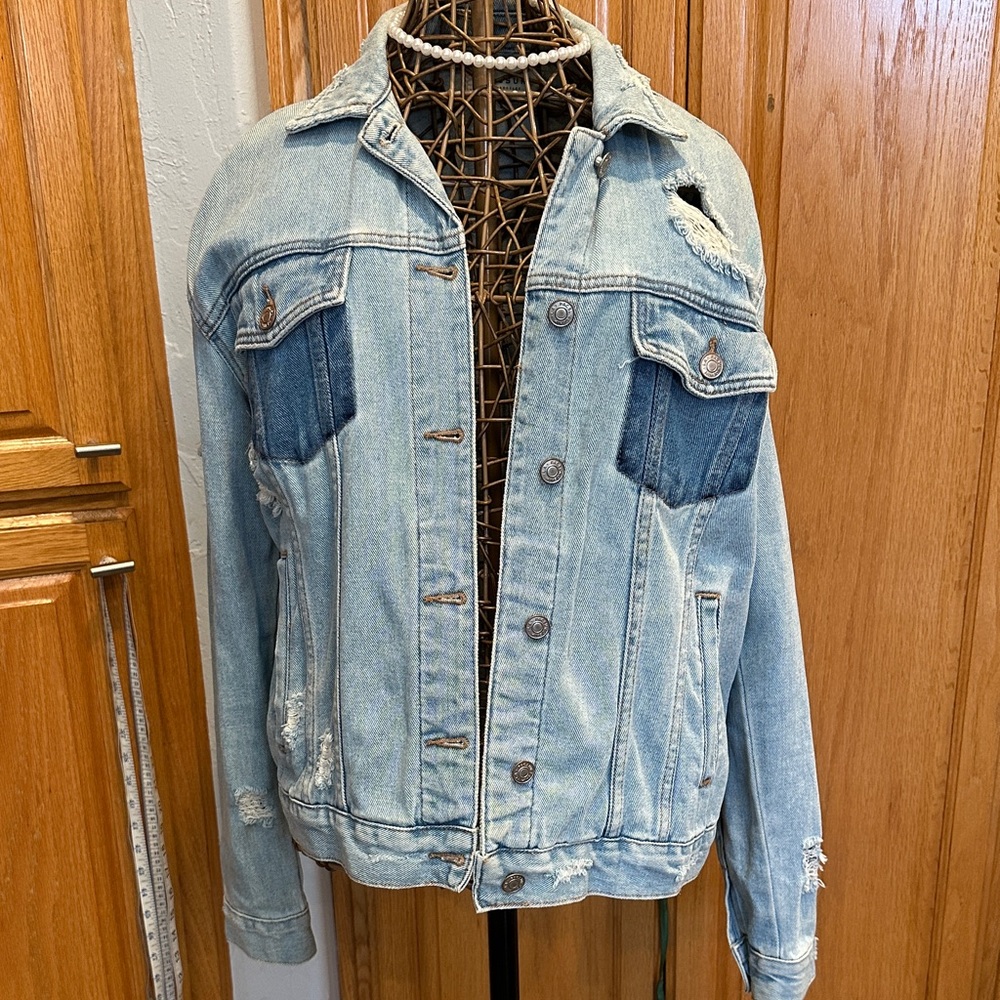 PacSun Light Blue Denim Jacket, Distressed. Pulled front pockets. Silver buttons